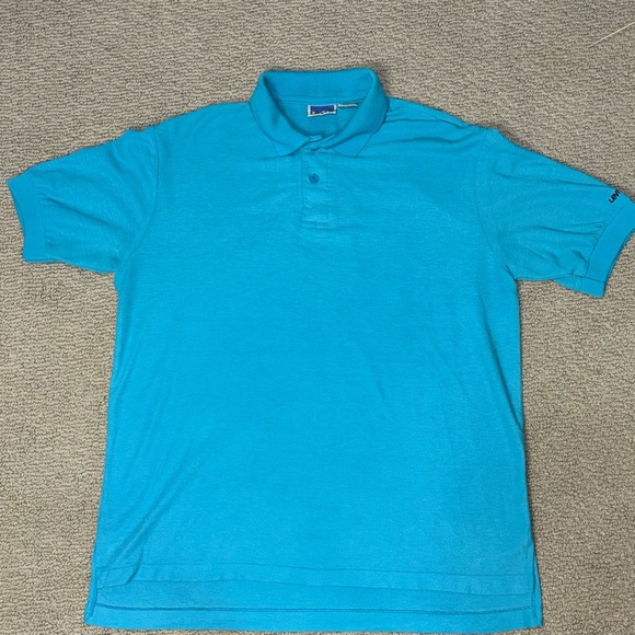 Vintage 1980s Levi's Men's Polo in a classic blue. Large. - Picture 1 of 7